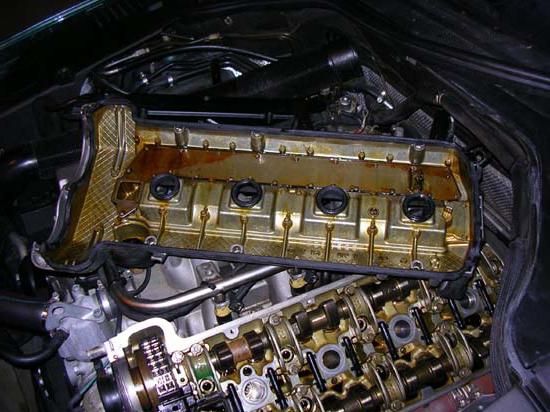 Почему в свечных колодцах масло и как устранить поломку. Что необходимо ...